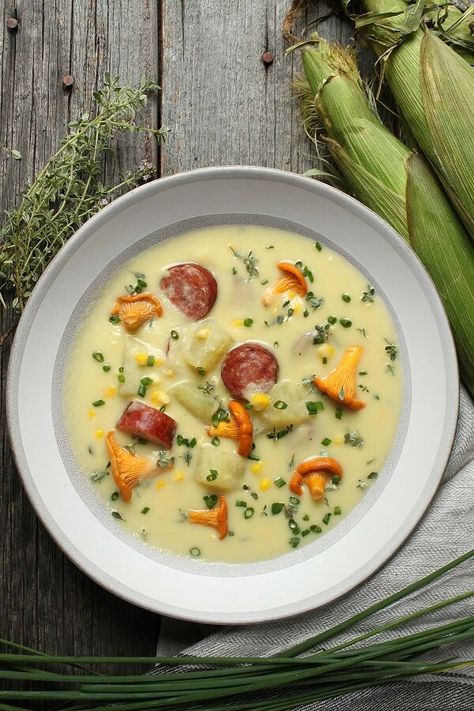 This Hearty Farmer's Sausage Sweet Corn Chowder features sweet corn, potatoes, farmer's sausage and chanterelle mushrooms in a rich cream based chowder. It is the perfect late summer/autumn comfort food. #cornchowder #soup #chowder #sweetcorn #chanterelles #farmerssausage Sweet Corn Chowder, Farmer Sausage, Pork Chop Dishes, Chanterelle Mushrooms, Cooking Wild Rice, Fall Comfort Food, Healthy Grains, Red Rice, Corn Chowder