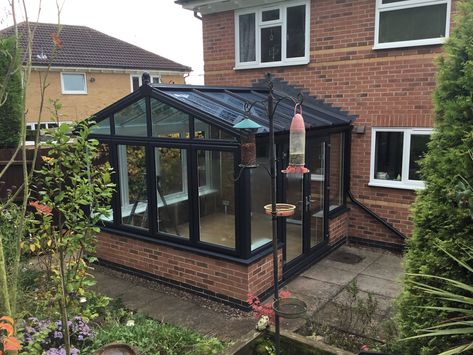 This beautiful Anthracite Grey Edwardian conservatory was fitted by our team at a customers property after their previous white conservatory had started to age and weather. But thanks to our team, the customer can now enjoy a brand new stylish conservatory. #Conservatory #HomeSpace #SlidingDoors #AnthraciteGrey #BasfordsEffect Stylish Conservatory, Conservatory Renovation, Grey Conservatory, White Conservatory, Edwardian Conservatory, Brick Rendering, Conservatory Interiors, English Townhouse, Conservatory Ideas