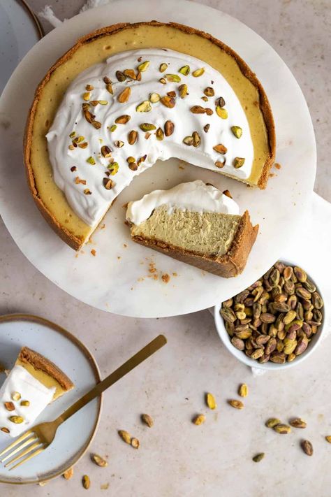 Indulge in a decadent treat with the creamy, nutty flavors of pistachio cheesecake. A rich cheesecake batter is enhanced with pistachio butter, resulting in a perfectly balanced sweetness that will leave your taste buds dancing. With a brown butter graham cracker crust, this dessert is sure to impress any crowd. #pistachio #pistachio butter #cheesecakerecipes #brownbuttercrust | themarblekitchen.com Graham Cracker Crust Cheesecake, Pistachio Cheesecake, Rich Cheesecake, Pistachio Butter, Marble Kitchen, Cracker Crust, The Marble, Graham Cracker Crust, Graham Cracker