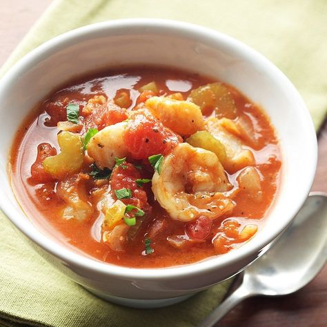 This fish and shrimp stew is often served over crostini or toast. With less than 200 calories per serving, it makes a great diet lunch or light dinner. Stew Fish Recipe, Italian Fish Stew, Stew Fish, Fish Stew Recipes, Shrimp Stew, Seafood Stew, Fish Stew, Fish Recipe, Stew Recipe