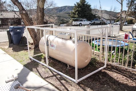 How To Build A Propane Tank Cover – SnapFence® Hide Propane Tank Ideas Backyards, Large Propane Tank Hide Cover Up, Cover Propane Tank Ideas, Ways To Hide Propane Tank In Yard, Hiding A Propane Tank Backyards, How To Hide A Propane Tank, Oil Tank Cover Ideas, Diy Propane Tank Cover, How To Hide Propane Tank In Yard