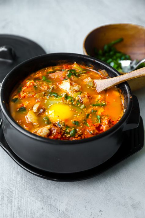 Restaurant-Style Korean Soondubu Jigae (Seafood Tofu Soup) - Unconventional Cooks Korean Seafood Stew, Jigae Recipe Tofu Soup, Korean Soondubu, Seafood Tofu Soup, Korean Restaurant Food, Korean Soup Recipes, Korean Soups, Soup Korean, Seafood Soup Recipes