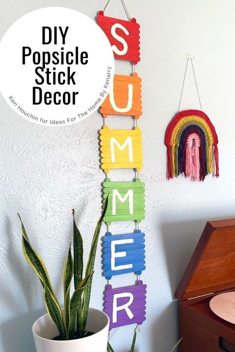 Cute and easy DIY wall art idea! Make cute popsicle stick decor to welcome summer with a fun rainbow sign that’s easy to make using dollar store supplies. Learn how at Ideas For The Home By Kenarry. #IdeasForTheHome #Kenarry Popsicle Stick Decor, Diy Rainbow Decorations, Easy Diy Wall Art, Cute Popsicle, Rainbow Room Decor, Wall Art Idea, Popsicle Stick Art, Diy Summer Decor, Stick Decor