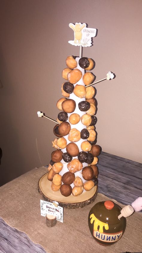 DIY Donut hole Beehive tower. Hundred Acre Wood Party/Classic Winnie the Pooh Birthday Party. Food ideas for party Donut Hole Beehive, Food Ideas For Party, Classic Winnie The Pooh Birthday, Birthday Party Food Ideas, Winnie The Pooh Birthday Party, Pooh Birthday Party, Diy Donut, Pooh Party, Diy Donuts