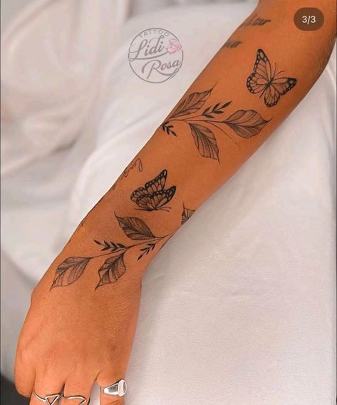 Long Hand Tattoo, Butterfly Half Sleeve Tattoo For Women, Flower And Butterfly Wrap Around Tattoo, Simple Flower Sleeve Tattoo, Middle Arm Tattoos For Women, Tattoo Wrapped Around Wrist, Simple Half Sleeve Tattoos For Women, Vine And Butterfly Tattoo, Simple Sleeve Tattoo Women