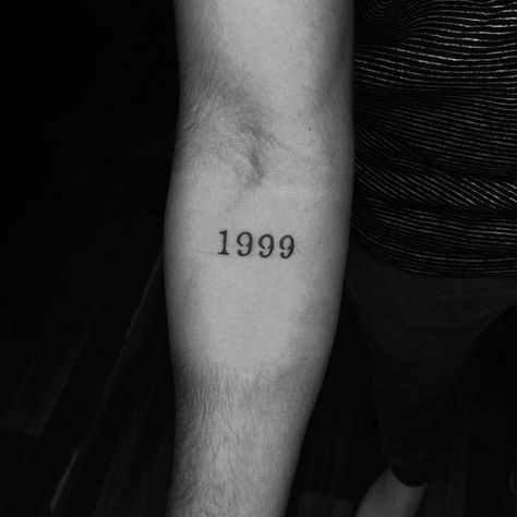 1999 AND JOVIAL Millennial /mɪˈlɛnɪəl/ a person born between the early 1980s and the late 1990s. Tattoos By @rahulbaarve @tattoouddhyog 1999 Tattoo Design, 1999 Tattoo, Birth Year Tattoo, Year Tattoo, Latest Tattoo Design, Tattoo Simple, Latest Tattoos, Birth Year, Simple Tattoos