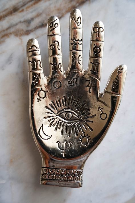 Introducing our Zodiac Motif Metal Hand - a beautifully crafted incense stick holder that also doubles as a jewelry plate, ring holder, trinket tray and perfect as a palo santo stick holder. Made from high quality metal, this zodiac piece is perfect for those who appreciate astrology, style and high quality. This lovely hand-crafted holder features the 12 signs of the zodiac, making it not only stylish but also a great conversation starter and birthday gift. Perfect for your favorite sticks of i Zodiac Floral, 12 Signs Of The Zodiac, Craft Holder, Incense Stick Holder, Incense Sticks Holder, 12 Signs, Aesthetic Decor, Metal Hand, Jewelry Tray