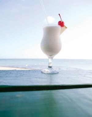 tropical milkshake | 1 oz. amaretto liqueur  1/2 oz. Kahlúa coffee liqueur  1/2 oz. Baileys Original Irish Cream  1 oz. vanilla ice cream  1 scoop of ice    1. Mix all ingredients in a blender. Serve in a tall stemmed glass; decorative paper parasol optional. Almond Drink Recipe, Toasted Almond Drink, Almond Cocktails, Almond Drink, Frozen Drinks Alcohol, Caribbean Drinks, Baileys Original Irish Cream, Baileys Original, Kahlua Coffee Liqueur