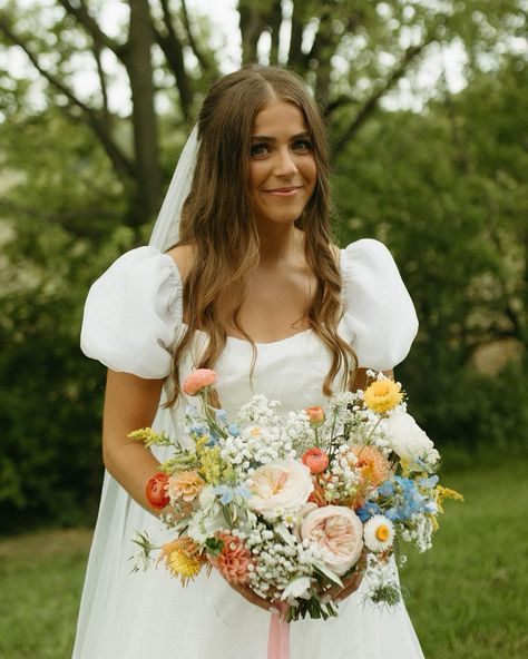 We love the flowers but THAT DRESS, AM I RIGHT | Instagram Wedding With A Lot Of Flowers, Engagement Pictures With Flower Bouquet, Champagne And Wildflower Wedding, Flowers September Wedding, Timeless Summer Wedding, Summer Florals Wedding, Fun Wedding Colors, About Time Wedding, Wild Flower Bouquet Wedding