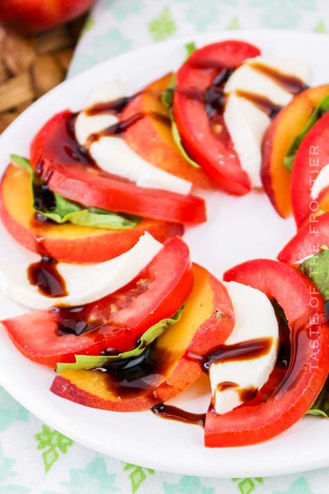 Peach Caprese Salad features juicy peaches, fresh mozzarella, basil, and a drizzle of balsamic glaze to create a perfect summer salad. Peach Caprese Salad, Peach Caprese, Summer Entertaining Recipes, Breakfast Donuts, Diy Dish, Quick Side Dishes, Edible Cookies, Side Dish Recipes Easy, Eat Lunch