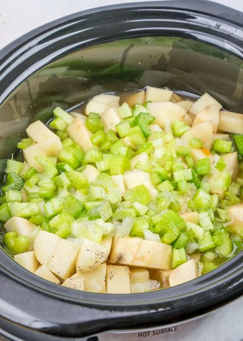 diced potatoes, celery, onion and garlic in a 6-quart oval crock pot Crock Pot Baked Potato Soup, Slow Cooker Potato Soup, Slow Cooker Potatoes, Crock Pot Potatoes, Vegetable Soup Healthy, Potato Soup Crock Pot, Crockpot Soups, Loaded Potato Soup, Crockpot Soup