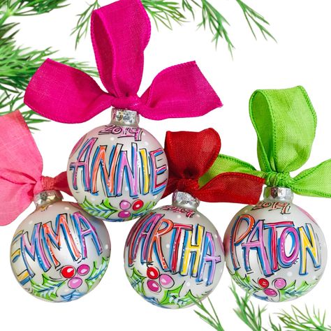 Personalized, hand painted holiday ornament. Hand-painted and personalized with the Name & year. THIS LISTING IS FOR THE ORNAMENT SHOWN ONLY. Please reach out if you need assistance with a custom order. INCLUDED WITH EACH ORNAMENT: - Free Personalization - Coordinating Ribbon Hanger - Gift Box. To make it easier for you, we pack each ornament in a protective gift box, ready for giving!  ::INSTRUCTIONS:: 1. Enter name in personalization box at checkout (indicate boy or girl or neutral, if applica Hand Painted Ceramic Christmas Ornaments, Custom Painted Ornaments, Personalized Ornaments Christmas, Hand Painted Ornaments Diy Christmas Balls, Personalized Acrylic Ornaments, Painting Ornaments Diy, Diy Painted Christmas Ornaments, Ornament Making Party, Diy Painted Ornaments