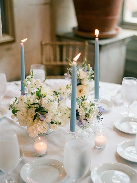 Garibaldi Cafe Wedding | Design Studio South | Savannah Wedding Photographer | Shannon Griffin #southernwedding  #film #filmweddingphotographer #fineartweddingphotographer #savannahweddingphotographer #shannongriffin #savannah #weddingdecor #garibaldicafe #monogrammednapkins #weddinglinens #designstudiosouth #katofloraldesigns #dotellcalligraphy Blue Pillar Candles Wedding, Light Blue White And Greenery Wedding, Dusty Blue Candles Wedding, Wedding Decorations White And Blue, Wedding Blue Flowers Decoration, Light Blue And Greenery Wedding, Long Hall Table, Dusty Blue Table Decorations, Dusky Blue Wedding Decor