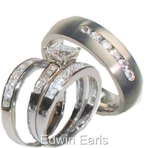 His & Hers 4 Piece Princess Cz Wedding Band Ring Set Sterling Silver & Titanium Edwin Earls offers this exquisite wedding engagement ring set. The center stone is a princess cut 6 mm square clear cz stone and square cut 3mm cut are on the shaft of the ring on either side of the center stone. Beautiful matching wedding band is included with 3mm square princess cut stones channel set. AAA quality cubic zirconia stones with extreme sparkle and shine. This beautiful 2 piece woman's wedding band set is made of solid 925 sterling silver and is rhodium plated with a high polish finish for extra protection and shine. We have paired our beautiful women's ring set with our man's comfort fit titanium with round cut cubic zirconia stones channel set in the band. Mans wedding band has the same AAA qual Sterling Silver Wedding Rings Sets, Cz Wedding Ring Sets, Cushion Cut Diamond Ring, Titanium Wedding Band, Wedding Rings Solitaire, Wedding Engagement Ring, Diamond Engagement Ring Set, Wedding Band Ring, Wedding Rings Vintage