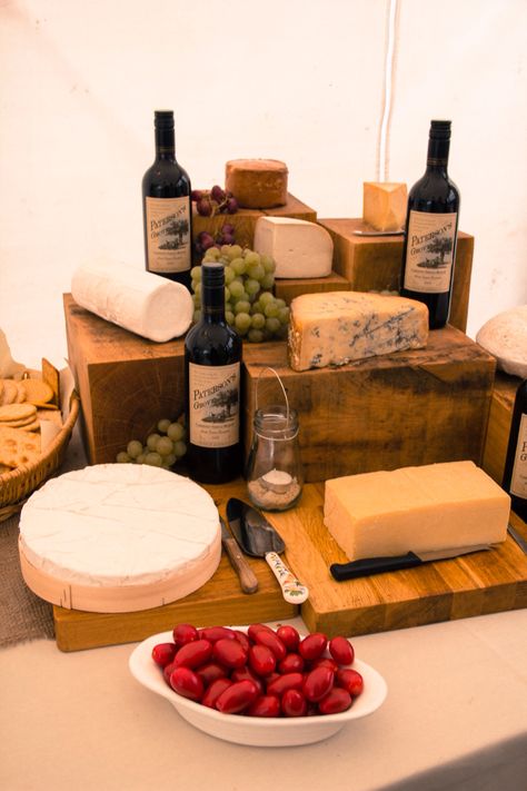 Cheese display on oak blocks Cheese Display Wedding, Cheese Trolley, Charcuterie Shop, Cheese Station, Cheese Boutique, Food Setup, Buffet Setup, Elevated Food, Raw Cheese