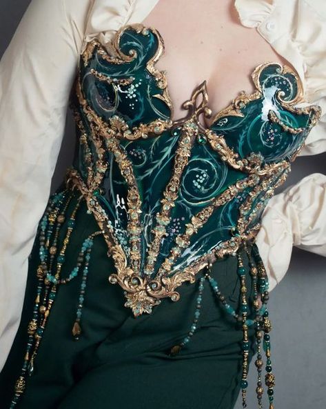 joyce Spakman on Instagram: "⠀⠀⠀⠀⠀⠀⠀⠀⠀ 𝓔𝓶𝓮𝓻𝓪𝓵𝓭 𝓫𝓪𝓻𝓸𝓺𝓾𝓮 𝓹𝓸𝓻𝓬𝓮𝓵𝓪𝓲𝓷 𝓬𝓸𝓻𝓼𝓮𝓽 ⠀⠀⠀⠀⠀⠀⠀⠀⠀ New corset design, one of a kind piece, launching today (march 16) at 20:00 CET. It will be for auction with 1 week bidding time. End date march 23. ⠀⠀⠀⠀⠀⠀⠀⠀⠀ Finished with high quality glass/ brass and crystal beading. ⠀⠀⠀⠀⠀⠀⠀⠀⠀ #corset #fashion #couture #baroquecorset #celebrity #baroque #handmade #art #handpainted #porcelain #porcelaincorset #green #emerals" Stained Glass Corset, Worbla Corset, Elven Corset, Dnd Alchemist, Beetle Cosplay, Porcelain Corset, Glass Corset, Princess Armor, Umbreon Cosplay