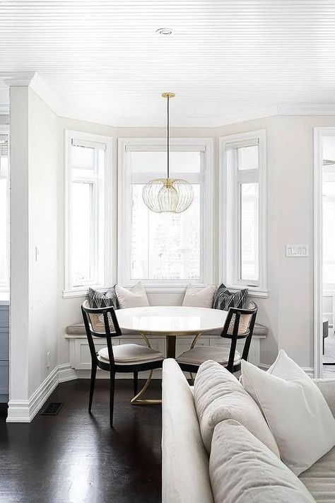 Breakfast Nook In Bay Window, Bay Window Built In Bench, Bay Window Dining Table, Black Cane Dining Chairs, Window Breakfast Nook, Breakfast Nook Ideas Bay Window, Small Bay Window, Bay Window Dining, Dining Room Bay Window