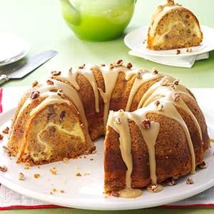 William Tell's Never-Miss Apple Cake  • 1 package (8 ounces) cream cheese, softened   • 2 cups sugar, divided   • 4 eggs   • 1 cup canola oil   • 2 cups all-purpose flour   •  2 teaspoons baking powder   •  2 teaspoons ground cinnamon   • 1 teaspoon salt   •  1/4 teaspoon baking soda   • 2 cups chopped peeled tart apples   • 1 cup shredded carrots William Tell Apple Cake, Praline Icing, Cake Apple, Cake Portions, Apple Spice Cake, Fresh Apple Cake, Jamie Jones, William Tell, Shredded Carrots