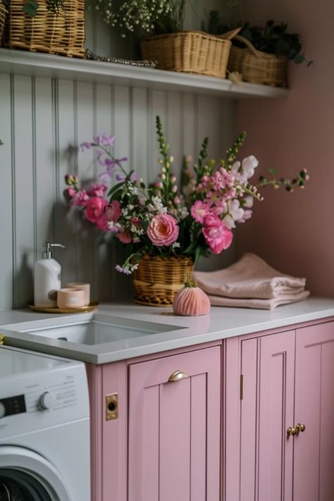 Looking to spruce up your laundry space? Discover 10 stylish laundry room counter ideas that will totally change the way you do laundry. From sleek designs to functional layouts, these counters are perfect for both beauty and utility. Say goodbye to messy laundry days and hello to organized bliss! Explore different materials, colors, and designs that will inspire you to create a welcoming laundry area you'll love. Upgrade your utility room with elegance and functionality, making it a space that works for you. Mauve Laundry Room Ideas, Floral Laundry Room Ideas, Pink Laundry Room Cabinets, Lilac Laundry Room, Purple Laundry Room, Pretty Laundry Room, Pink Laundry Room, Laundry Counter, Chic Laundry Room