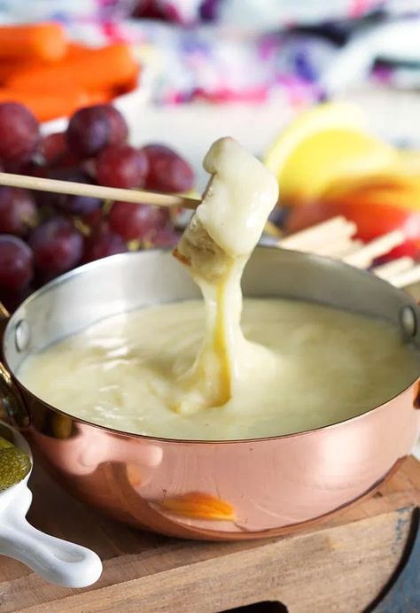 Swiss Cheese Fondue Recipe - The Suburban Soapbox Swiss Cheese Fondue Recipe, Cast Iron Fondue, Cheddar Fondue, Fondue Dippers, Swiss Cheese Fondue, Swiss Fondue, Beer Cheese Fondue, Fondue Recipes Cheese, Donut Toppings