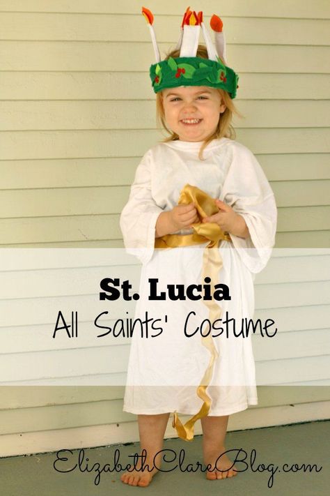 What a simple All Saints' Day Costume. St. Lucia-too cute! St Lucia Crown, All Saints Day Costumes, Lucy Costume, St Maximilian Kolbe, Saint Costume, St Lucia Day, Maximilian Kolbe, Eve Costume, St Maximilian