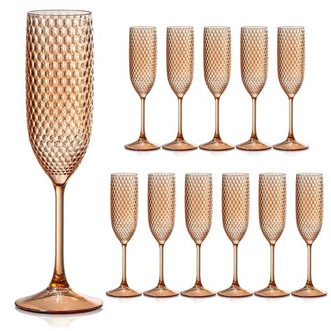 PRICES MAY VARY. 1.Enter a world of luxury and style with our Gatsby-style glasses. Immerse yourself in the charm of the olden days and enjoy your favorite wine in these exquisite vessels. Let's go back to the 1920's party! 2. Sufficient Quantity:You will have a sufficient supply of Champagne Glasses for a medium-sized party, event, or family celebration. This ensures that all your guests can enjoy a good drink without having to worry about the cups running out quickly. 3. Elegant Design: Our wi Boho Champagne Glasses, Champagne Flute Decorations, Prom Food, Gold Goblet, Fancy Wine Glasses, 1920's Party, Plastic Champagne Glasses, Clear Drinking Glasses, Vintage Champagne Glasses