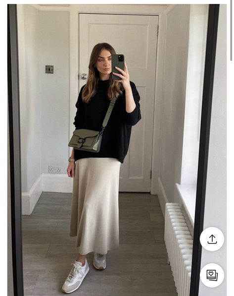 Cream Silk Skirt Outfit Winter, Aritzia Midi Skirt, Satin Skirt Sweatshirt, Padded Top Outfit, Taupe Satin Skirt Outfit, Aw23 Fashion Trends Women, Satin Beige Skirt Outfit, Knit Maxi Skirt Outfit Winter, Soft Chic Style