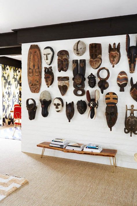 Must Have African inspired Decor | African Mask accent wall African Decor Living Room, African Bedroom, African Interior Design, African Inspired Decor, Parker Palm Springs, African Interior, Afrikaanse Kunst, African Home Decor, African Mask