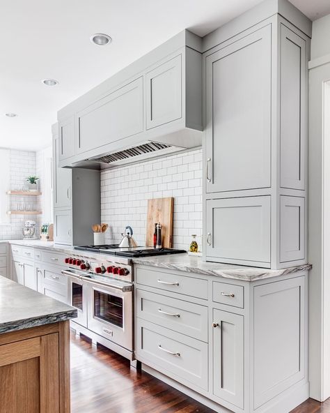 Cabinet color is Benjamin Moore Coventry Gray Light Grey Kitchen Cabinets, Stove Hood, Light Grey Kitchens, Kitchen Cabinets Makeover, Cabinetry Design, Oak Kitchen, Grey Kitchen Cabinets, Kitchen Cabinet Colors, Design Seeds