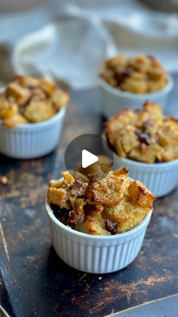 Denise Marchessault on Instagram: "🥖🍞Elevate leftover bread with budget-friendly Bread Pudding. It makes a luxurious treat that’s best enjoyed warm. 

Best prepared a day in advance so the bread fully absorbs the custard and the flavours have a chance to meld. 

makes six 

6 cups cubed day-old bead,* crusts removed, about one baguette or small loaf 
1 ½ Tbsp unsalted butter, plus more for the ramekins/muffin tins 
2 Tbsp granulated sugar, plus more for the ramekins/muffin tins 
2 tsp ground cinnamon
2 Granny Smith apples, peeled, cored, and diced
1/4 tsp kosher salt
⅓ cup chopped, dried cranberries
⅓ cup chopped walnuts 
3 eggs
¾ cup whole milk 
¾ cup whipping cream

* I prefer sourdough but any bread works 

Preheat oven 350ºF.

Place the bread cubes in a large bowl.

Coat six standard Pudding Cup Recipes, Leftover Bread, Bread And Butter Pudding, Pudding Cups, Bread Pudding Recipe, 3 Eggs, Whipping Cream, Muffin Tins, Granny Smith Apples