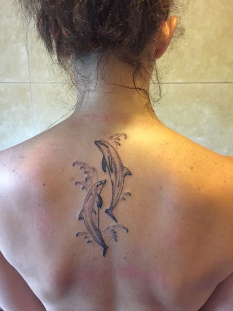 Unique Dolphin Tattoo, Dolphin Back Tattoo, Dolphin Spine Tattoos, Dolphins Tattoo For Women, Dolphin Rib Tattoo, Two Dolphins Tattoo, Dolphin Tattoo For Women, Dolphin Tattoo Design, Tattoo Down Spine