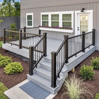 Trex Enhance 6-ft x 2.75-in x 42-in Charcoal Black Composite Deck Rail Kit in the Deck Railing Systems department at Lowes.com Elevated Deck, Trex Enhance, Deck Stair Railing, Grey Deck, Black Railing, Deck Railing Systems, Aluminum Balusters, Composite Deck Railing, Modern Stair Railing