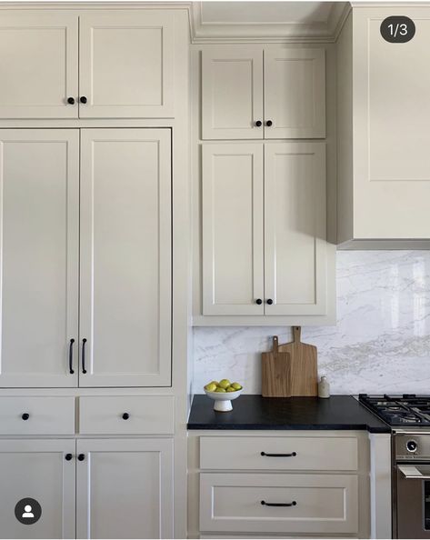 Taupe Cabinets, Honed Black Granite, Taupe Kitchen Cabinets, Black Kitchen Countertops, Taupe Kitchen, Beige Cabinets, Black Countertops, Condo Kitchen, Kitchen Cabinet Colors