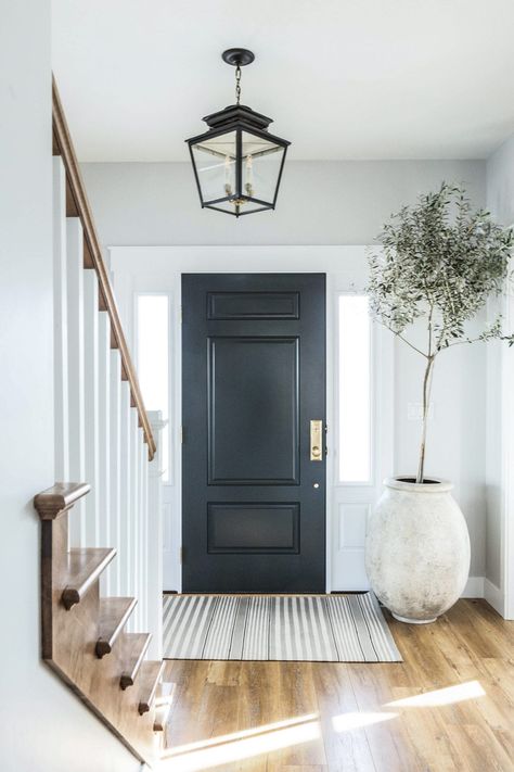 Black Front Doors Interior Entryway, Stairs In Front Of Door Entryway, Transitional Entry, Front Door Interior, Interesting Interiors, Entry Ideas, Black Front Doors, Door Colors, Entryway Inspiration