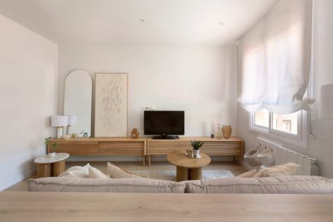 Wooden media credenza in neutral living room. Barcelona Flat, West Elm Style, Media Credenza, Nathan James, Modern Accent Tables, Bright Apartment, Gorgeous Houses, Types Of Furniture, Construction Process