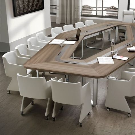 Whether you are hosting an executive board meeting or a creative workshop, the hexagonal shape of the Leader conference table offers the ideal solution. It is made of a panel of wood composite, veneered in eucalyptus essence; its central strip, covered in leather, incorporates ten retractable workstations.

#office #officesolution #officedesk #conferencetable #meetingdesk Office Cubicle Design, Office Reception Table Design, Conference Table Design, Meeting Table Office, Reception Table Design, Cubicle Design, Conference Room Design, Dining Room Design Luxury, Modern Conference Table