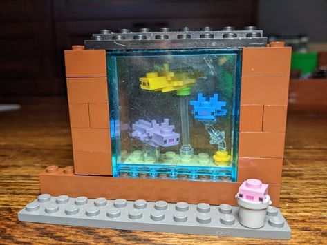 Lego Minecraft Axolotl, Toy Fish Tank, Lego Axolotl, Minecraft Axolotl Tank, Axolotl Tank Minecraft, Axolotl Tank Ideas Minecraft, Axolotl Perler Beads, Fish Tank Minecraft, Lego Fish Tank