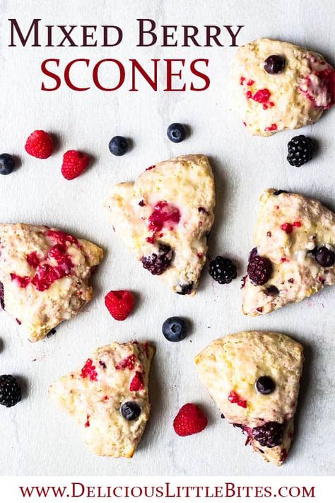 Mixed Berry Scones with Vanilla Glaze - a trio of berries in a moist, tender buttermilk based scone recipe. These easy, delicious scones can be enjoyed for breakfast, brunch, or as a sweet dessert. They are the best scones to enjoy with a hot cup of coffee or tea. | #scones #glazedscones #breakfast #ssconesrecipe #mixedberries Mixed Berry Scones Recipe, Mixed Berry Scones, Mixed Berry Recipes, Berry Scones Recipe, The Best Scones, Best Scones, Tea Scones, Berry Scones, Raspberry Scones