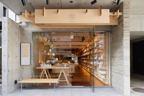 The wood sign with its small simple logo above this tea shop in Japan looks clean and natural against the concrete building it's attached to. Japanese Coffee Shop, Dressing Design, Japanese Shop, Japan Store, Tea Store, Interior Vintage, Indie Room, Shop Front Design, Retail Design Blog