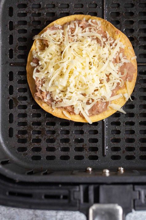 Air fryer tostadas are crispy and delicious. These tostada shells are easy to make in the air fryer and can be topped with a variety of tasty toppings. Tostada Shells In Air Fryer, Air Fryer Tostadas, Tostada Shells, Fryer Recipes, Air Fryer Recipes, Air Fryer, Shells, Canning