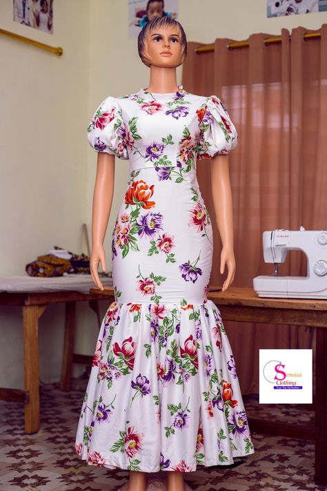 Fit with flare end full Gown with puff sleeves by Semasa Clothing. 0243742208 Crepe Gown Style In Nigeria, Flower Material Gown Styles, Crepe Gown Styles, Gown With Puff Sleeves, Flare Gown Styles, Materials Gown Style, Classy Couture, Simple Gown, Full Gown