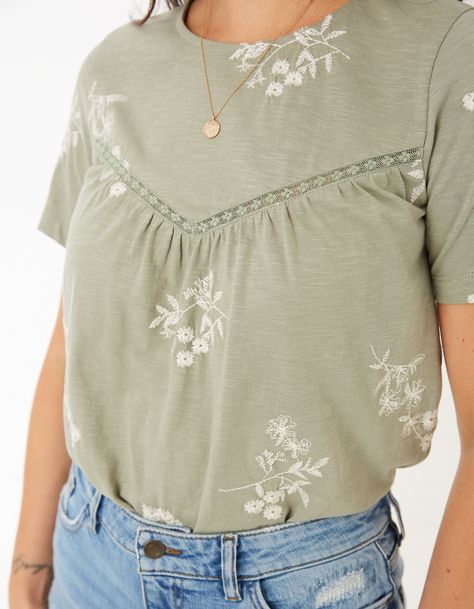 Add an extra special look to your everyday wardrobe with this pretty embroidered stripe top. Loose-fitting and super comfortable, it features a simple crew neck, lace detailing and short, comfy sleeves. It's super versatile, too. Team it with jeans, a skirt or joggers - the choice is yours! Modest Tops, Green Sage, Feminine Top, Stripe Top, Feminine Outfit, Neck Lace, Embroidered Top, Modest Outfits, Spring Summer Fashion