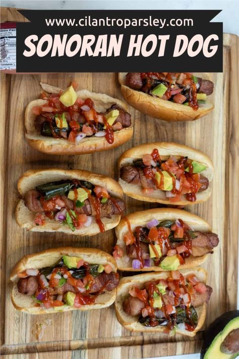 This Sonoran Hot Dog Recipe is made by wrapping each hot dog with bacon, baking them, and topping each hot dog with jalapeños and pico. Sonoran Hot Dog Recipe, Hod Dog, Mexican Hot Dogs, Sonoran Hot Dog, Hot Dog Recipe, Bacon Wrapped Hotdogs, Cilantro Parsley, Egg Burger, Hot Dog Toppings