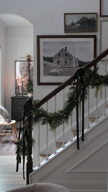 Patti Roberts on Instagram: "What’s your favorite Christmas movie? For me it’s 1. Home Alone 2. The Santa Claus 3. Elf. This year I went with black velvet ribbon on my staircase to match my black stained dresser in the back room. I added a wreath to my vintage shelf and I’m loving how it all came together! Last year when I posted my staircase, I got so many questions about the garland. These are old garland from Target but I’ve linked the most similar ones I could find and they are still in stock!! Get your garland while you can because last year garland couldn’t be found after Thanksgiving! I added a few dark preserved eucalyptus stems to this as well. They are also Linked! Have a wonderful Friday friends! #foyerinspo #holidays #garland #christmas #staircasedesign #staircasegarland # Christmas Stairs, Christmas Staircase, Staircase Decor, Christmas Inspo, Christmas Mood, Christmas House, Christmas Deco, Cozy Christmas, Christmas Garland