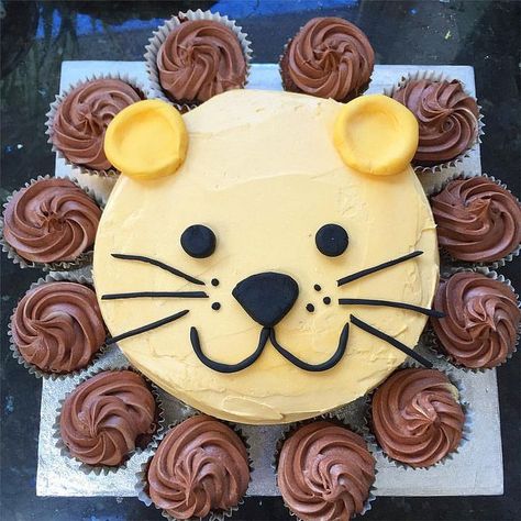 For a second birthday party, a lion cake. An 8 inch sponge cake, covered in orange-tinted buttercream. Sugarpaste ears, eyes, nose, mouth and whiskers. Chocolate cupcakes around the edge for the mane. Easy Birthday Cake, Lion Cake, Torte Creative, Lion Birthday, Torte Cupcake, Easy Birthday, Animal Cakes, Simple Birthday Cake, Boy Birthday Cake