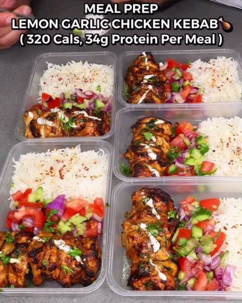 Meal Preparation on Instagram: "HIGH PROTEIN MEAL PREP JUICY LEMON GARLIC CHICKEN KEBAB🍗 by @zack.chug (320 Cals, 34g Protein, 5g Fat, 39g Carbs per meal) The ingredients used in this is to make one big meal prep to then portion equally into 5 servings for the week !! * ��To a Bowl add : * ��75g low fat Greek yoghurt ‼️ * Tbsp olive oil🫒 * Minced garlic 🧄 * Lemon 🍋 juice * Tbsp oregano & tbsp cumin 🌿 * 600g raw diced chicken 🍗 * Mix well and optional to add them to skewers🤌, * Oven or air fry for 20-25 mins @ 220°C until juicy and tender 😍 * ��for the garlic sauce : - ��50g low fat Greek yoghurt‼️ - ��Tbsp garlic paste 🧄 - Lemon 🍋 juice - Grated cucumber 🥒 - Tsp oregano 🌿 - Mix well‼️ - �� Meeanwhile cook 200g of uncooked washed rice ( will equal roughly 630g cooked rice 🍚 ) & Zack Chug, Meals Under 400 Calories, Healthy Prepared Meals, Protein Meal Prep, Healthy Weight Gain Foods, Chicken Kebab, Tiffin Recipe, High Protein Meal, Meal Prep For Beginners