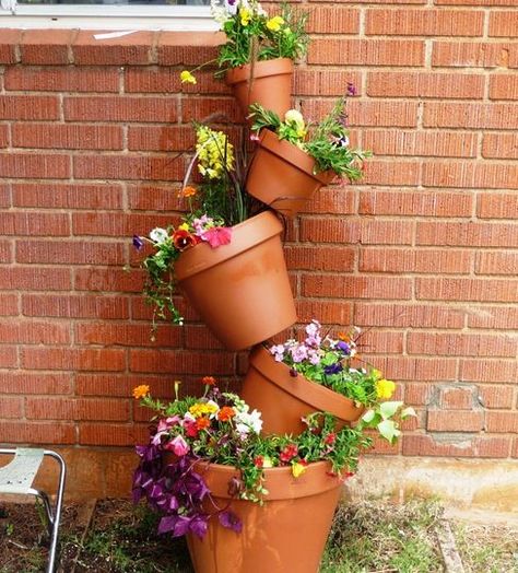 http://www.instructables.com/id/My-DIY-Instructions-for-a-Tipsy-Plant-Tower/ Plant Tower, Planting Pots, Floral Arranging, Growing Gardens, Thriving Garden, Garden Makeover, Garden Maintenance, Patio Plants, Porch Garden