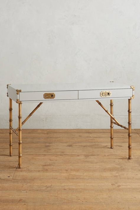 Faux bamboo legs and campaign style drawers. Anthropologie Lacquered Wellington Desk Aqua Bedroom, Bamboo Bedroom, Singapore House, Apartment Wishlist, Campaign Chest, Campaign Desk, Wingback Chairs, Hanging Furniture, Bamboo Furniture