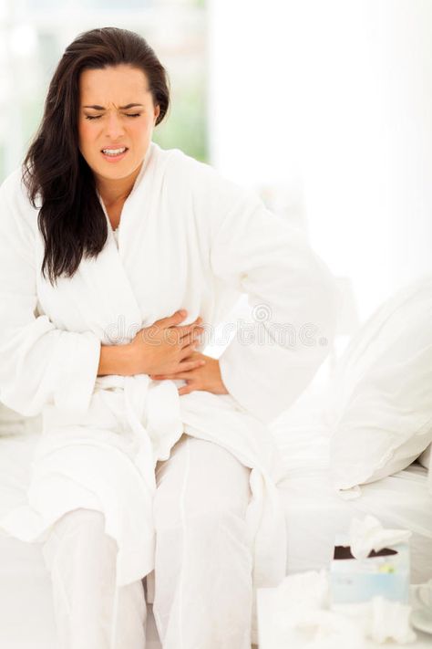 Woman stomach pain. Young woman having stomach pain at home #Sponsored , #paid, #PAID, #stomach, #home, #woman, #Woman Woman Stomach, Silent Reflux, Stomachache, Warm Lemon Water, Stomach Ache, Stomach Acid, Stomach Pain, Acid Reflux, Health Risks