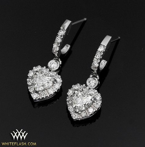 Platinum Diamond Heart Earrings set with two Heart cut diamonds and adorned with Whiteflash A Cut Above Diamond melee.